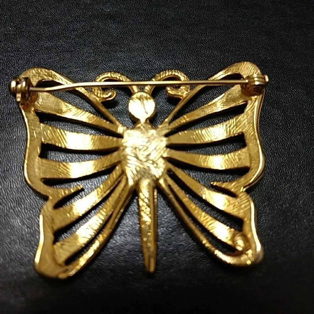 Vintage gold tone butterfly with rhinestone pin brooch